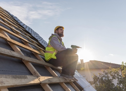 man sitting on roof